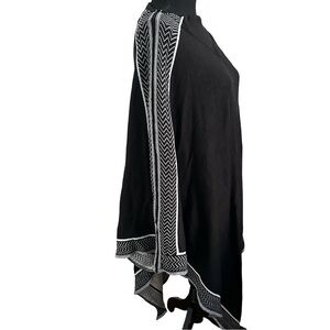 Chic Black and White Knit Poncho by Mille Collins